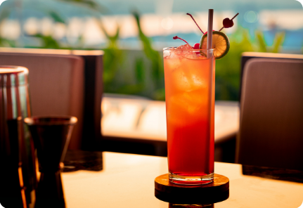 Cocktail and sunset dining scene